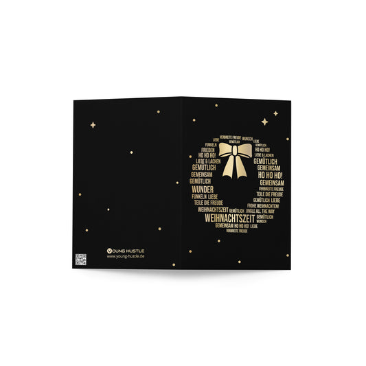 Weihnachtskarte mit Weihnachtskranz und goldener Schleife